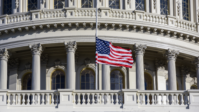American flag in front of the US Capitol